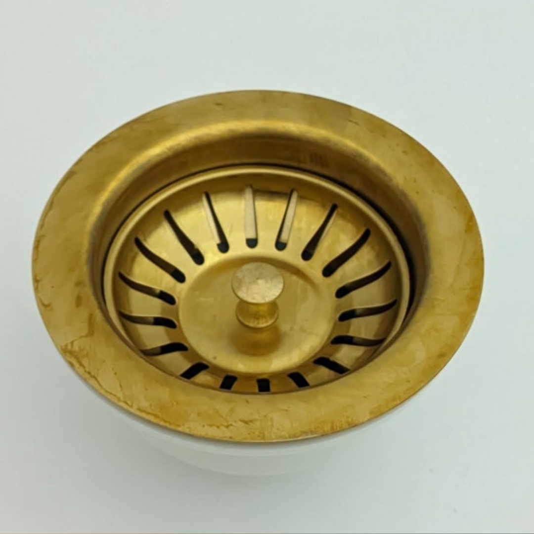 Brass basket strainer patina detail