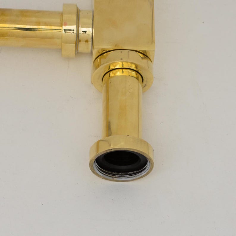 Solid brass water trap finish