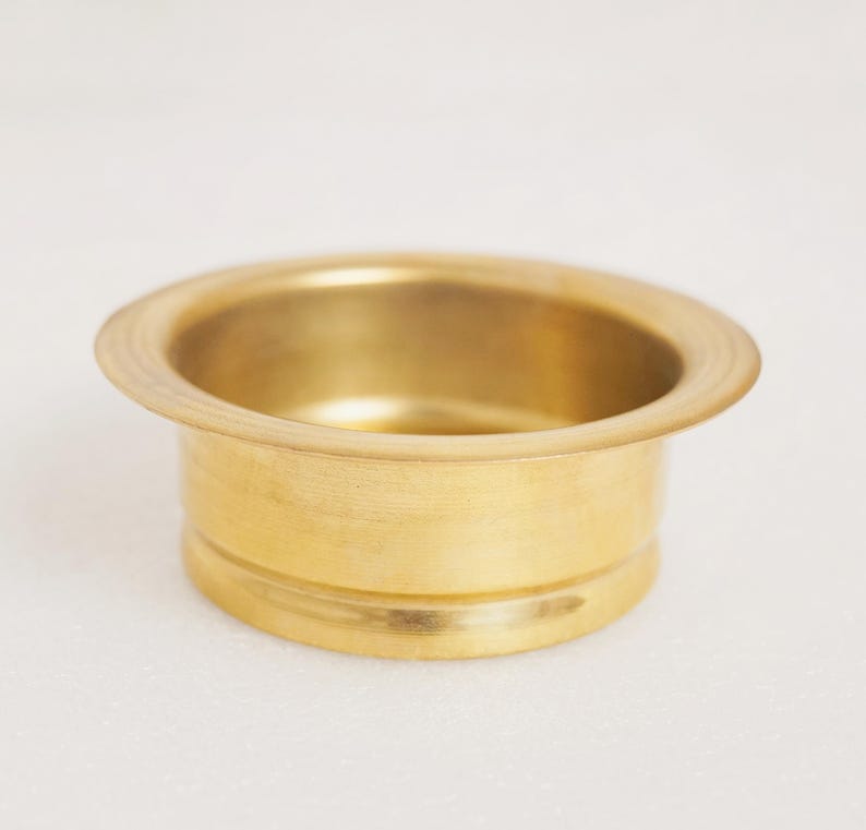 Detail of solid brass disposal flange