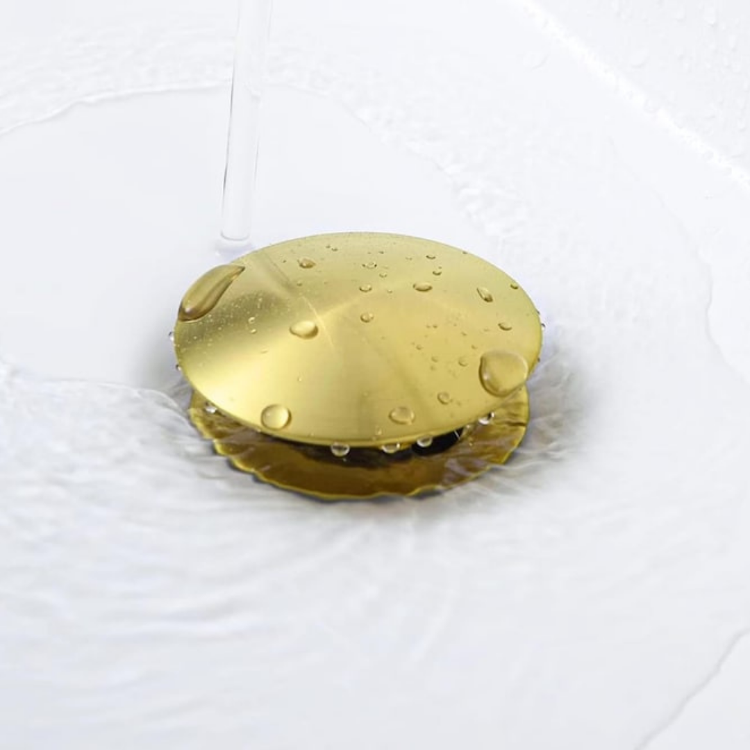 Detail of the unlacquered brass pop-up drain stopper