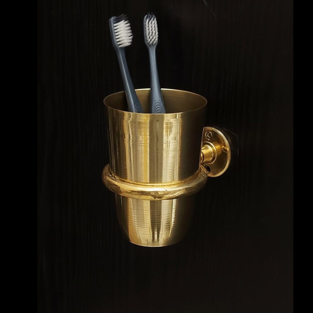 Artisan brass cup for bathroom organization