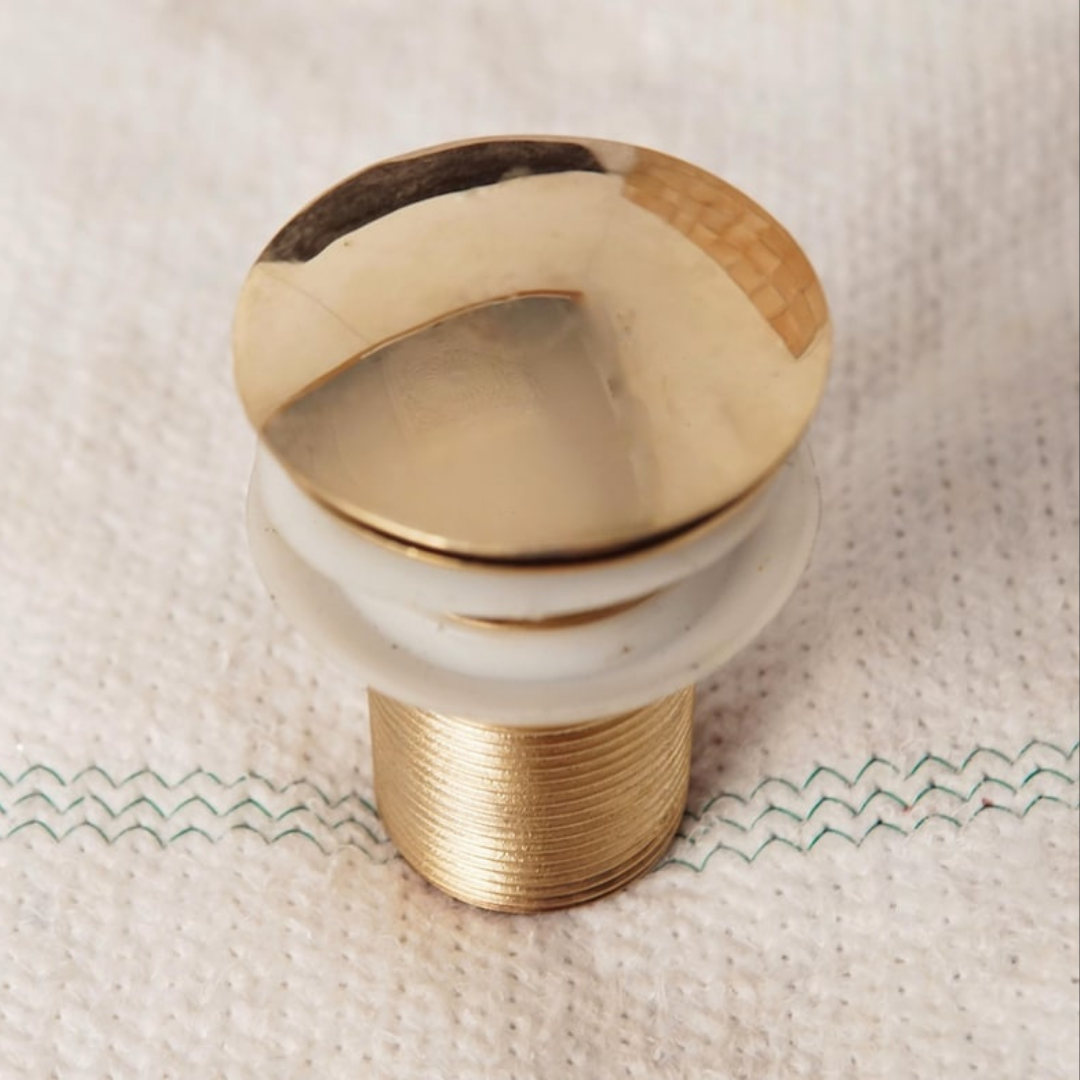 Artisan brass sink plumbing detail