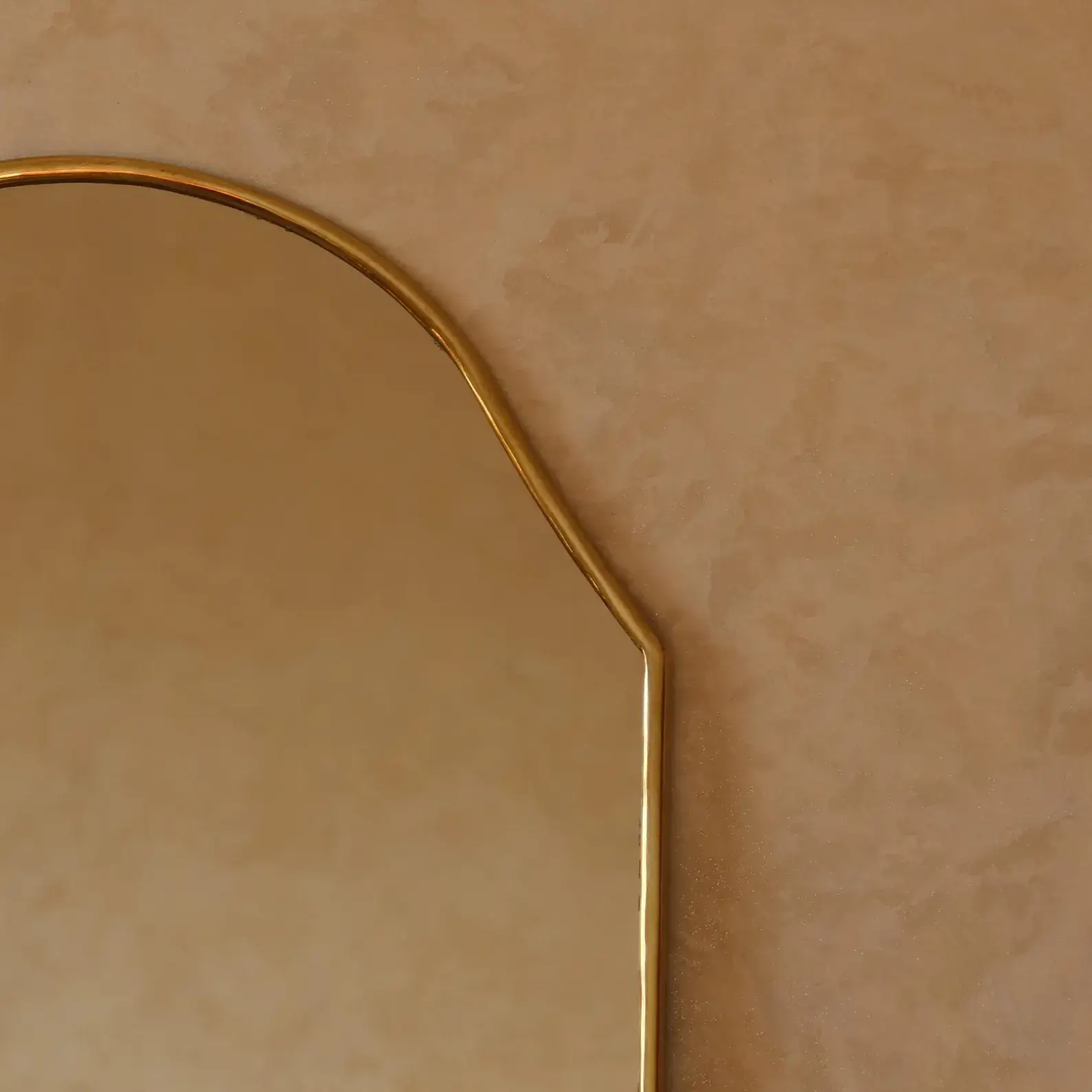Ines Irregular Curved Brass Mirror editorial detail